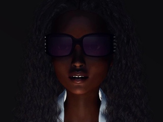 Female android plays with an alien in the sci-fi lab